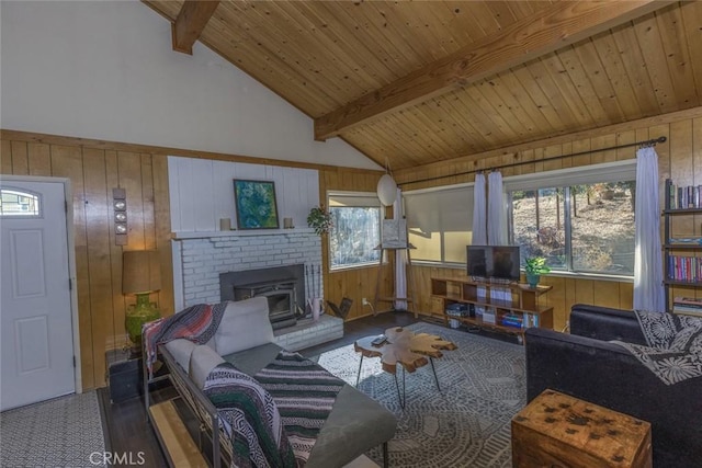 living room with lofted ceiling with beams, wood walls, wood-type flooring, and wooden ceiling