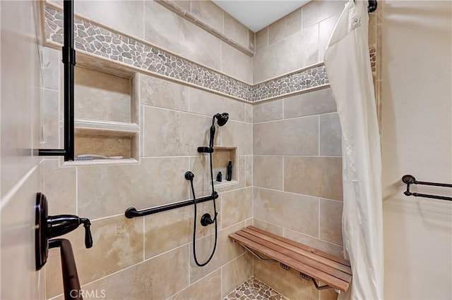 interior space with a shower with shower curtain