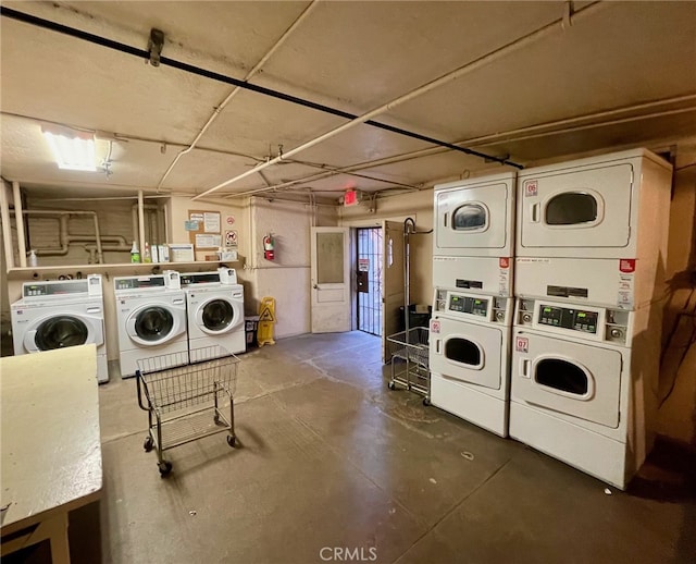 clothes washing area with independent washer and dryer and stacked washing maching and dryer