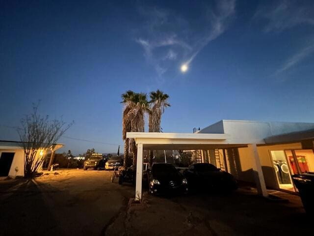 exterior space featuring a carport