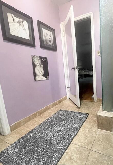 bathroom featuring tile patterned flooring