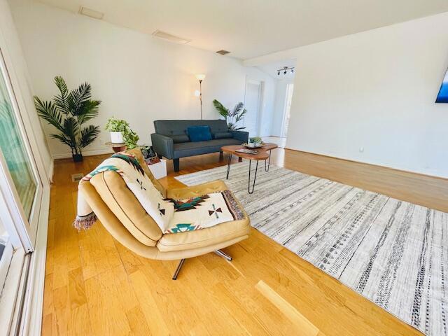 living room with hardwood / wood-style floors