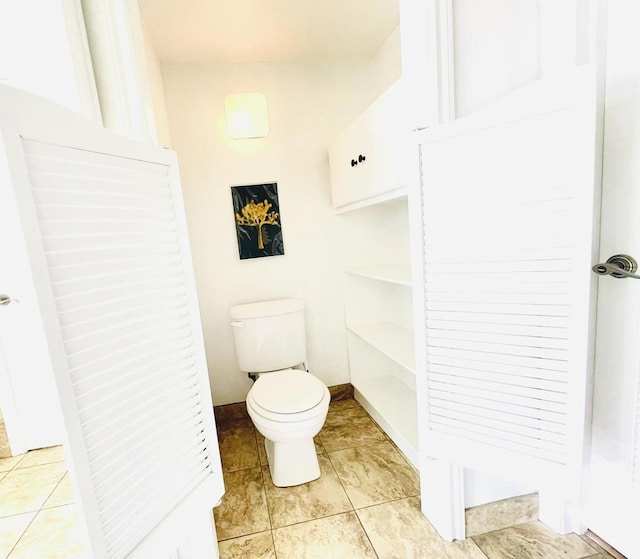 bathroom featuring toilet