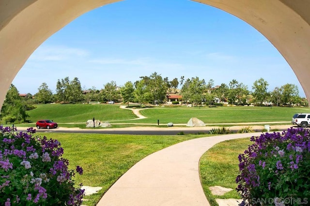 view of community with a lawn