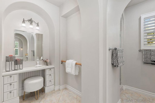 bathroom featuring tile patterned floors and vanity