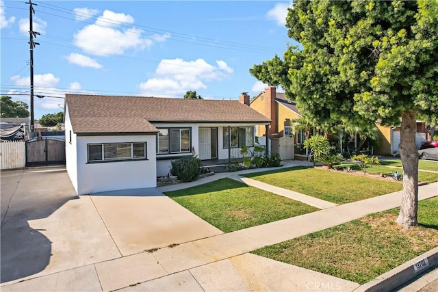 view of front of property with a front lawn and a porch