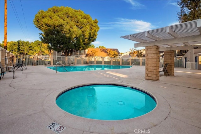 view of pool featuring a pergola and a patio