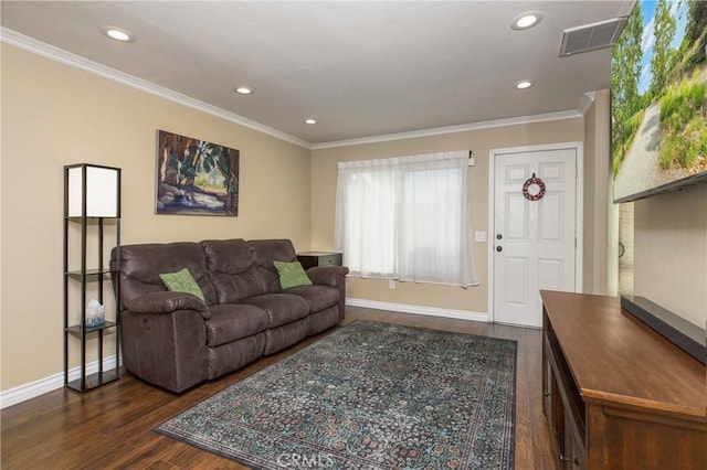 living room featuring dark hardwood / wood-style flooring and crown molding