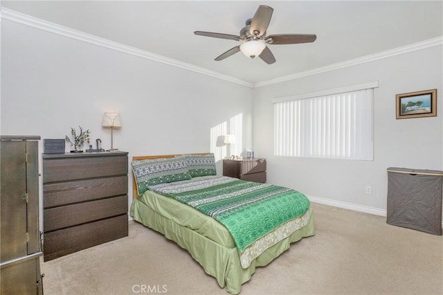 bedroom featuring light colored carpet, ceiling fan, and ornamental molding