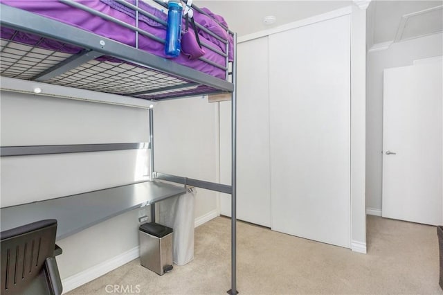 bedroom with light carpet and ornamental molding