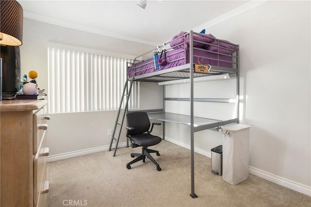 carpeted bedroom featuring ornamental molding