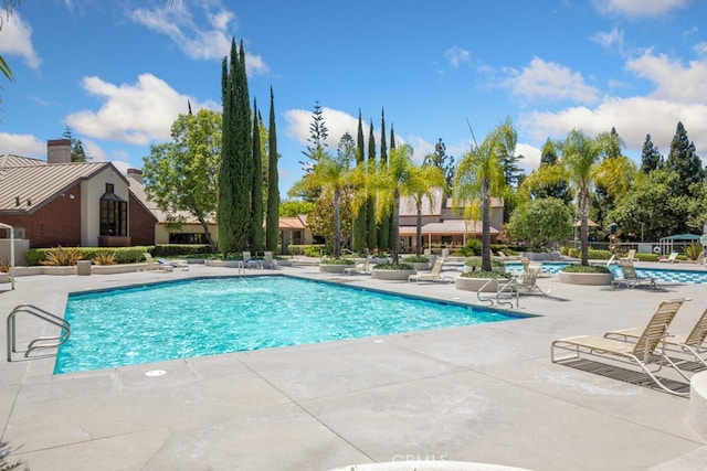 pool featuring a patio area