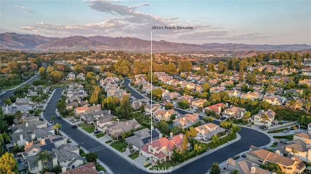 aerial view at dusk with a mountain view