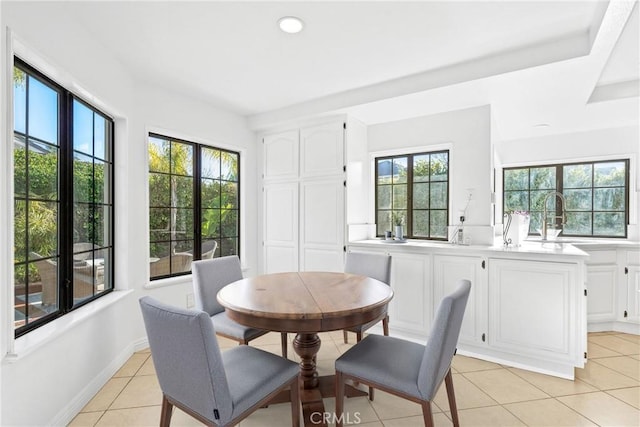 dining space featuring recessed lighting, light tile patterned flooring, and baseboards