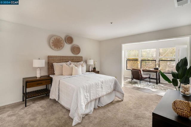 bedroom with light carpet