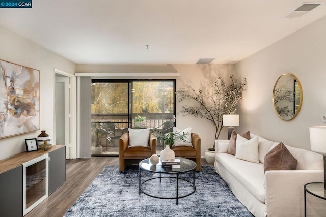 living room with hardwood / wood-style flooring