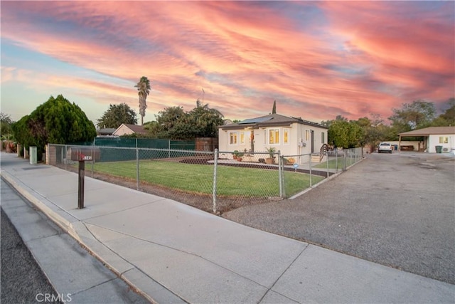 view of front of home featuring a yard