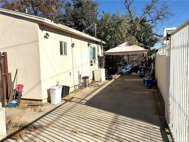 view of property exterior featuring a gazebo