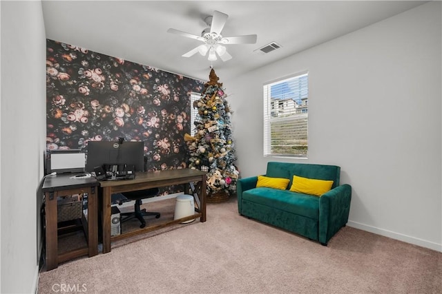 office area with carpet and ceiling fan