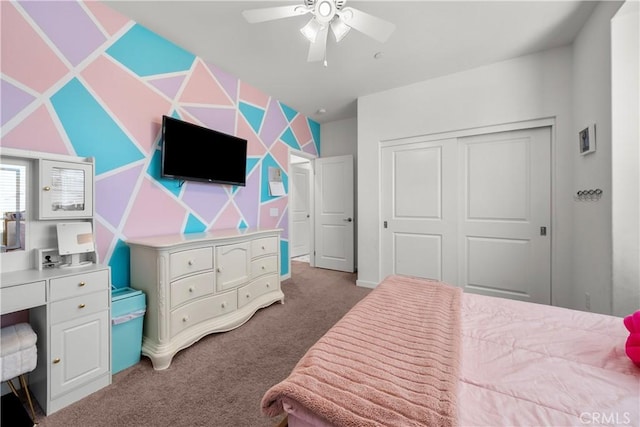 bedroom featuring carpet floors, a closet, and ceiling fan