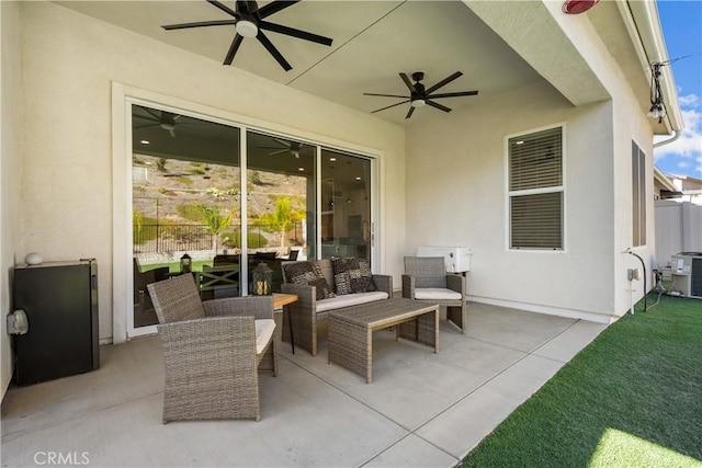 view of patio with an outdoor living space and central air condition unit