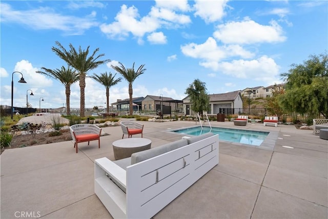 view of pool featuring a patio