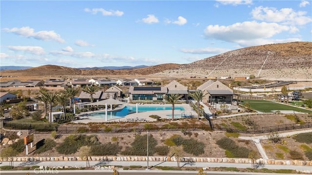 view of swimming pool featuring a mountain view