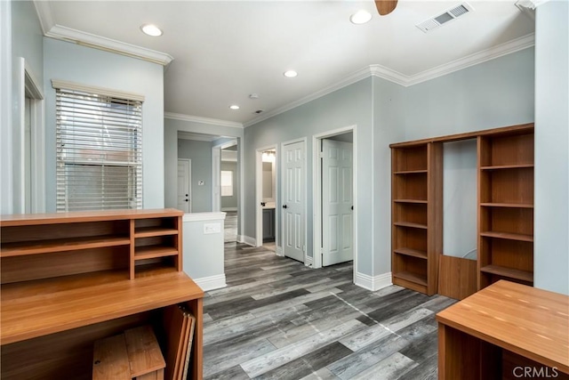 mudroom featuring crown molding and dark hardwood / wood-style flooring