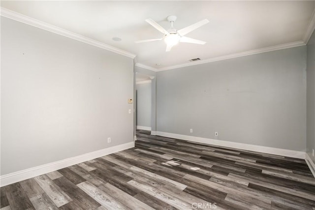 empty room featuring crown molding, ceiling fan, and dark wood-type flooring