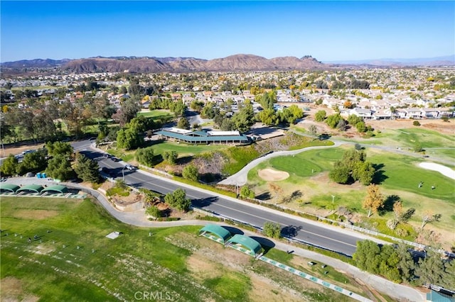 birds eye view of property featuring a mountain view