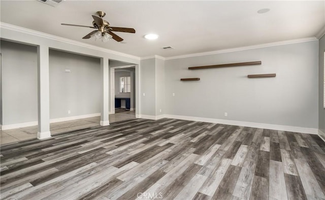 basement with dark hardwood / wood-style floors, ceiling fan, and ornamental molding