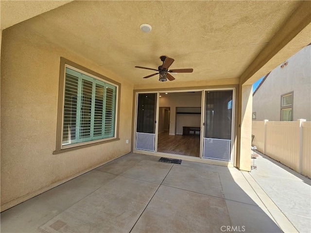 view of patio featuring ceiling fan