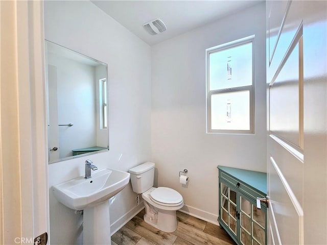 bathroom with toilet and sink