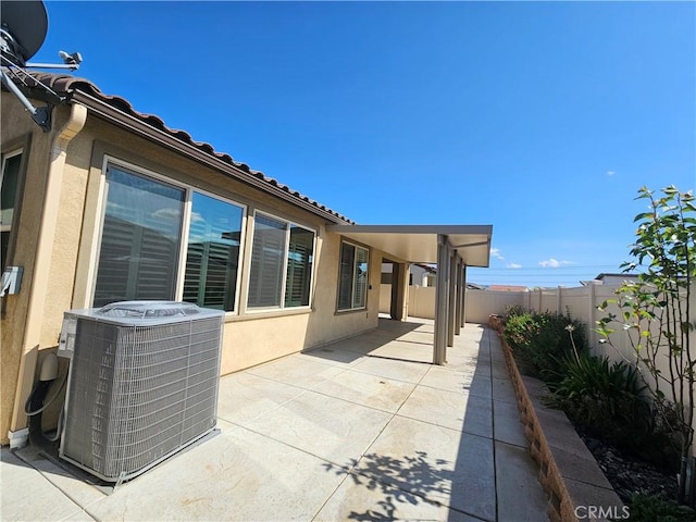 view of patio with central AC unit