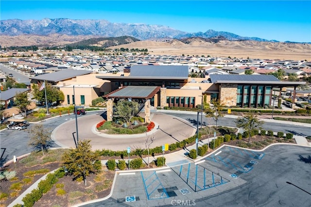 birds eye view of property featuring a mountain view