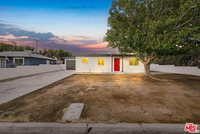 ranch-style home with a garage