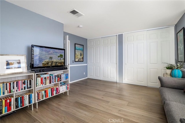 living area featuring hardwood / wood-style flooring