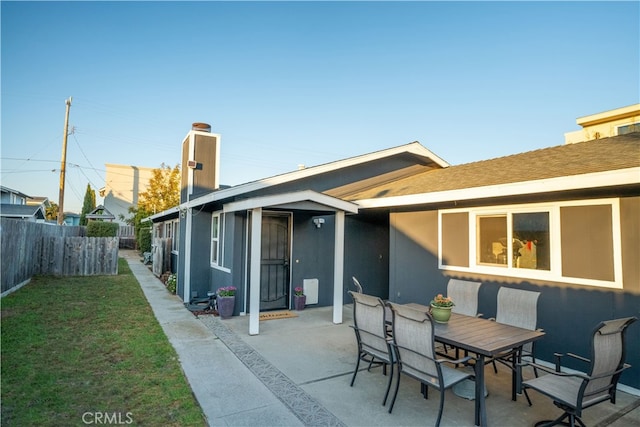 rear view of house featuring a patio area