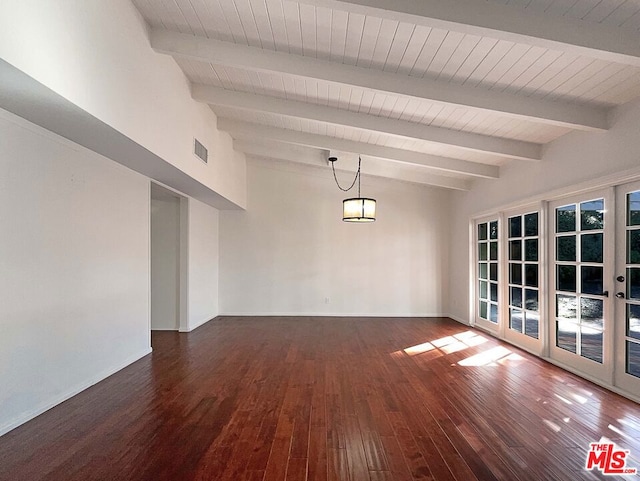 unfurnished room with beamed ceiling, french doors, and dark wood-type flooring