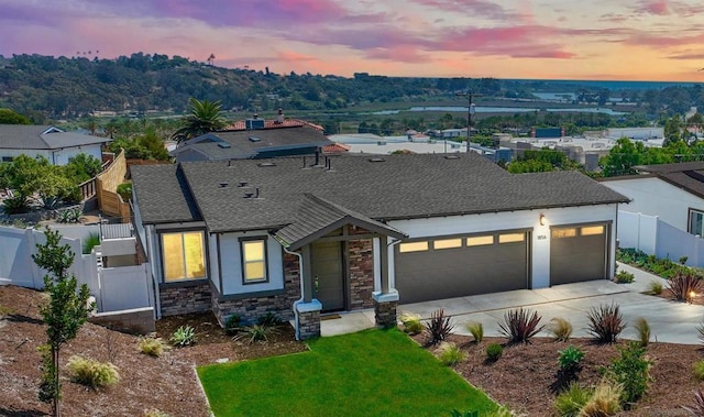 view of front of property featuring a garage