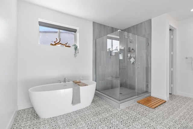 bathroom featuring tile patterned flooring and shower with separate bathtub