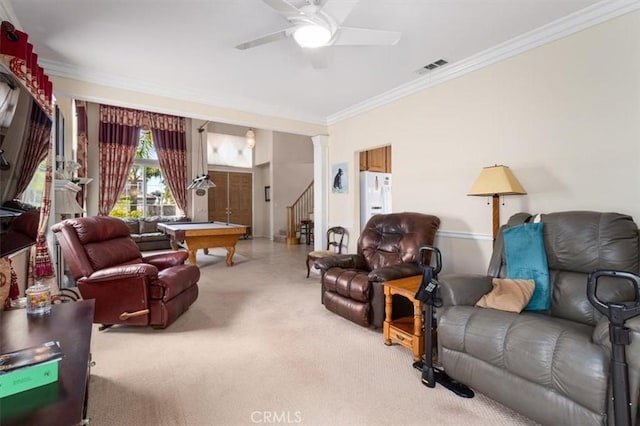 carpeted living room with ceiling fan, crown molding, and pool table