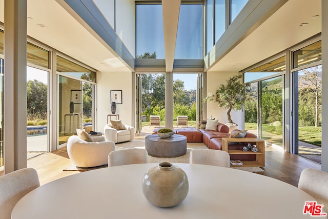 sunroom featuring a healthy amount of sunlight