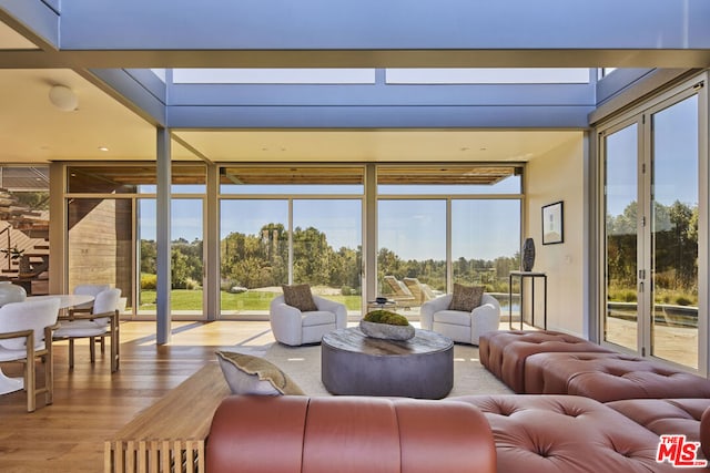 sunroom / solarium featuring plenty of natural light