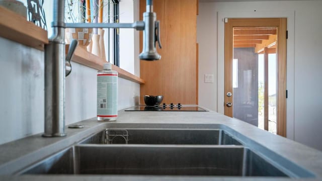 room details with black electric stovetop