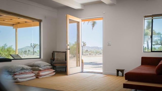 interior space featuring a mountain view and a wealth of natural light