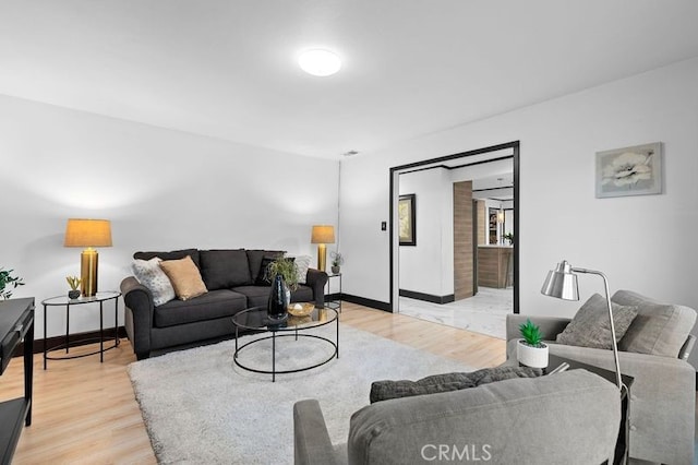 living room featuring light wood-type flooring