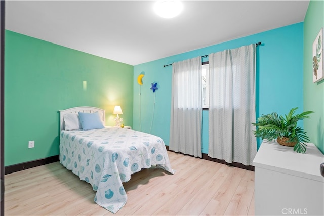 bedroom featuring light hardwood / wood-style floors