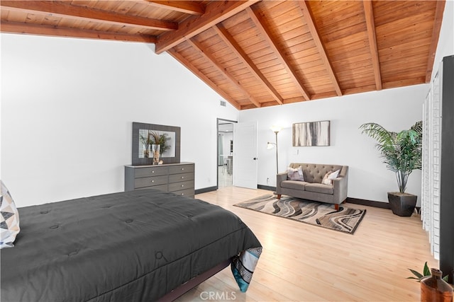 bedroom with beamed ceiling, light wood-type flooring, high vaulted ceiling, and wood ceiling