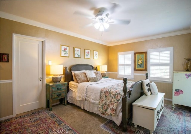 bedroom with carpet flooring, ceiling fan, and ornamental molding